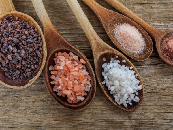 a-variety-table-salts-and-sea-salts-on-wooden-spoons